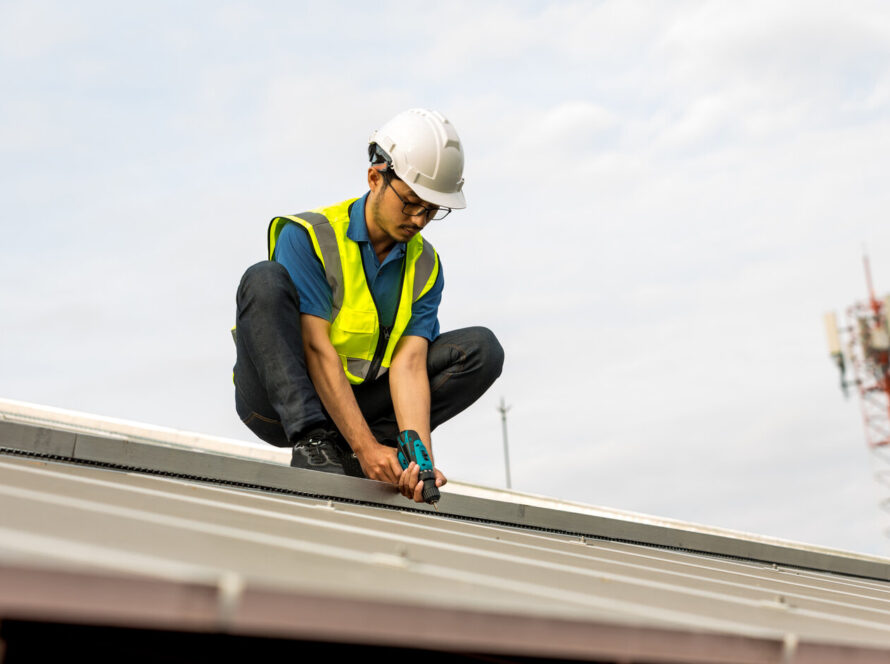 man fixing the roof