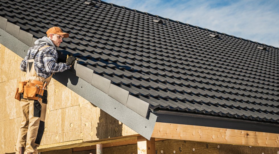 Ceramic House Tiles Roof Construction Theme Black Ceramic House Tiles Roof Construction Theme. Contractor Roofer Checking on Finished Building Roof.